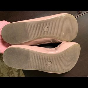 Nude patent leather ballet flats